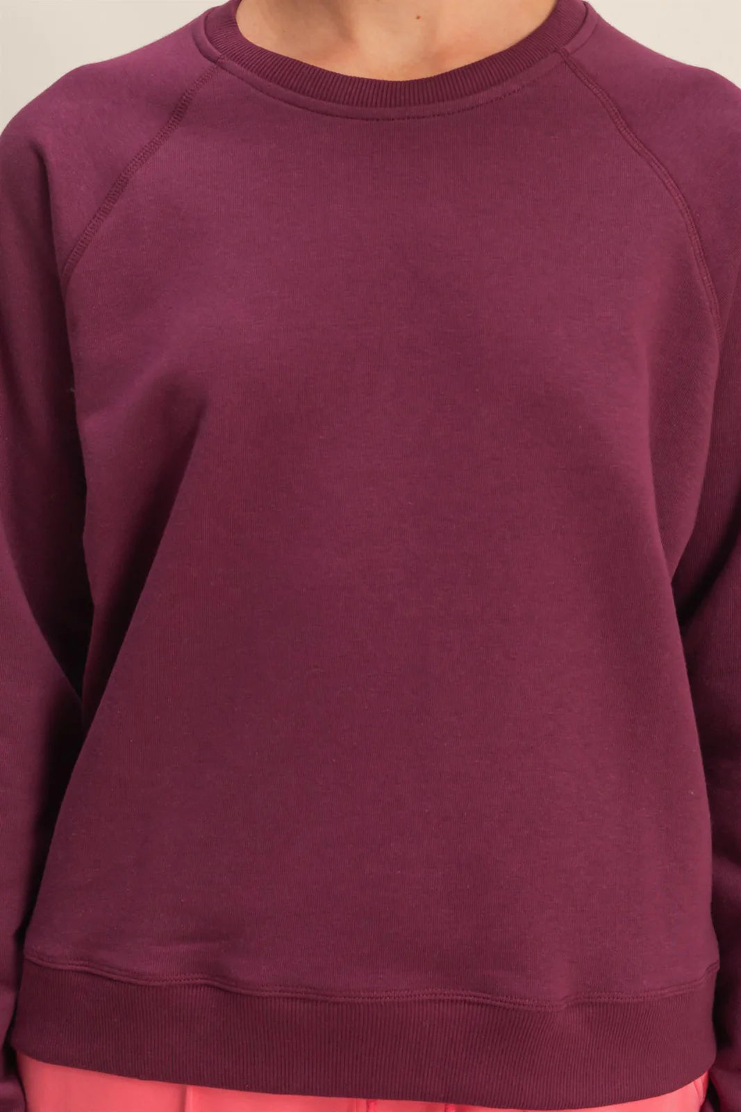 Dark Cherry sweatshirt worn by a person, with a focus on the garment.