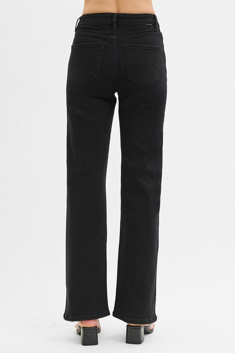 Black flared jeans on a white background