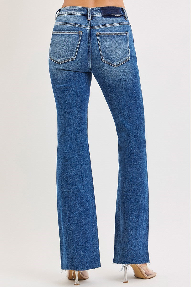 Risen Uma Blue jeans worn by a person on a white background