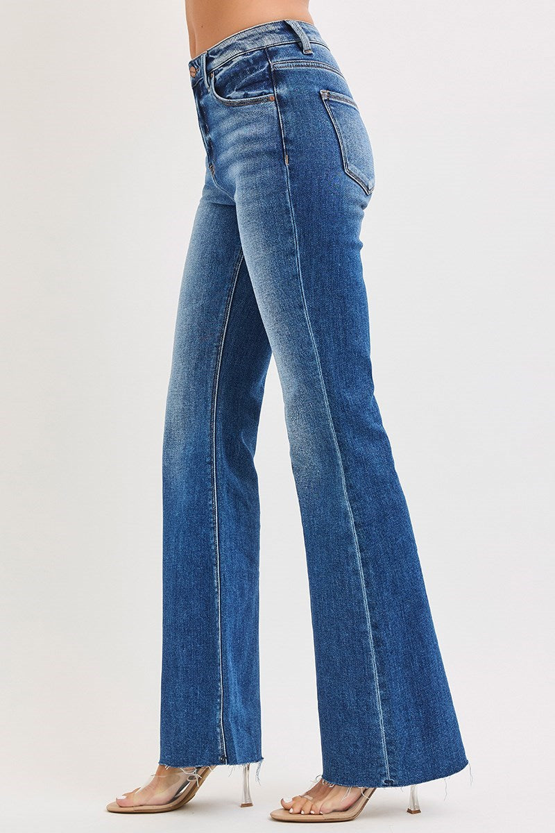 Risen Uma Blue jeans worn by a person on a light gray background